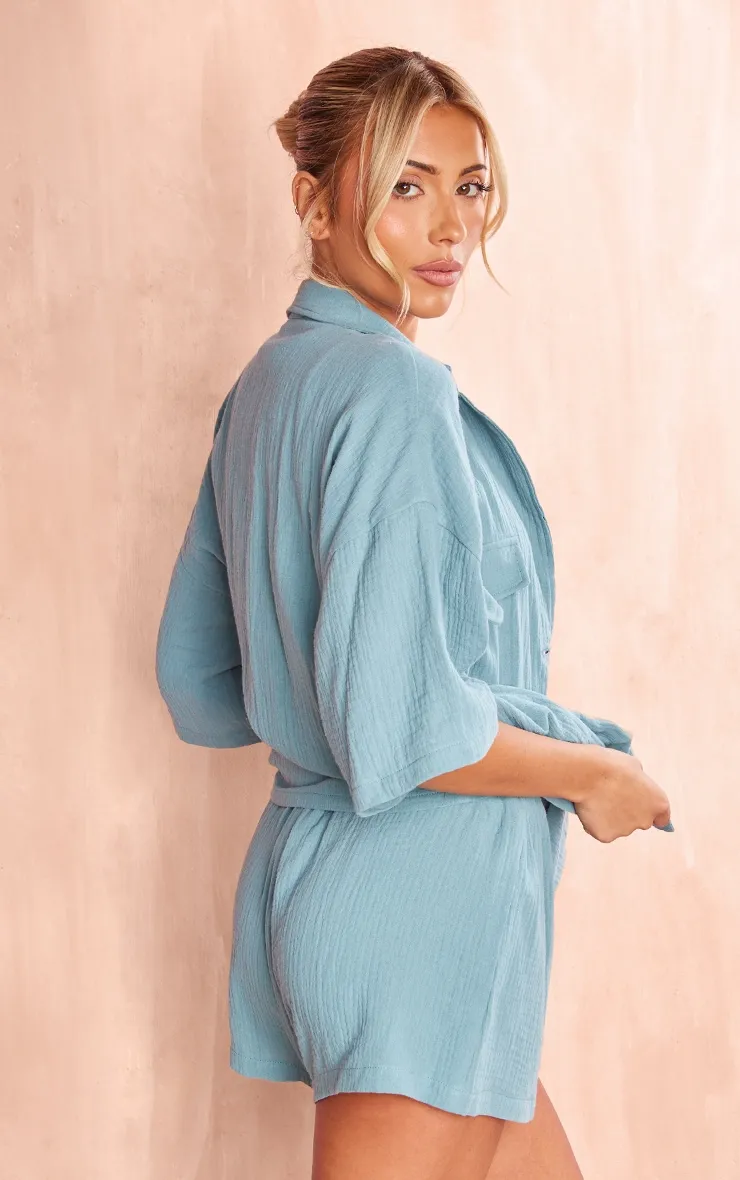 Chemise oversize bleu clendré en maille tissée à manches courtes et poches