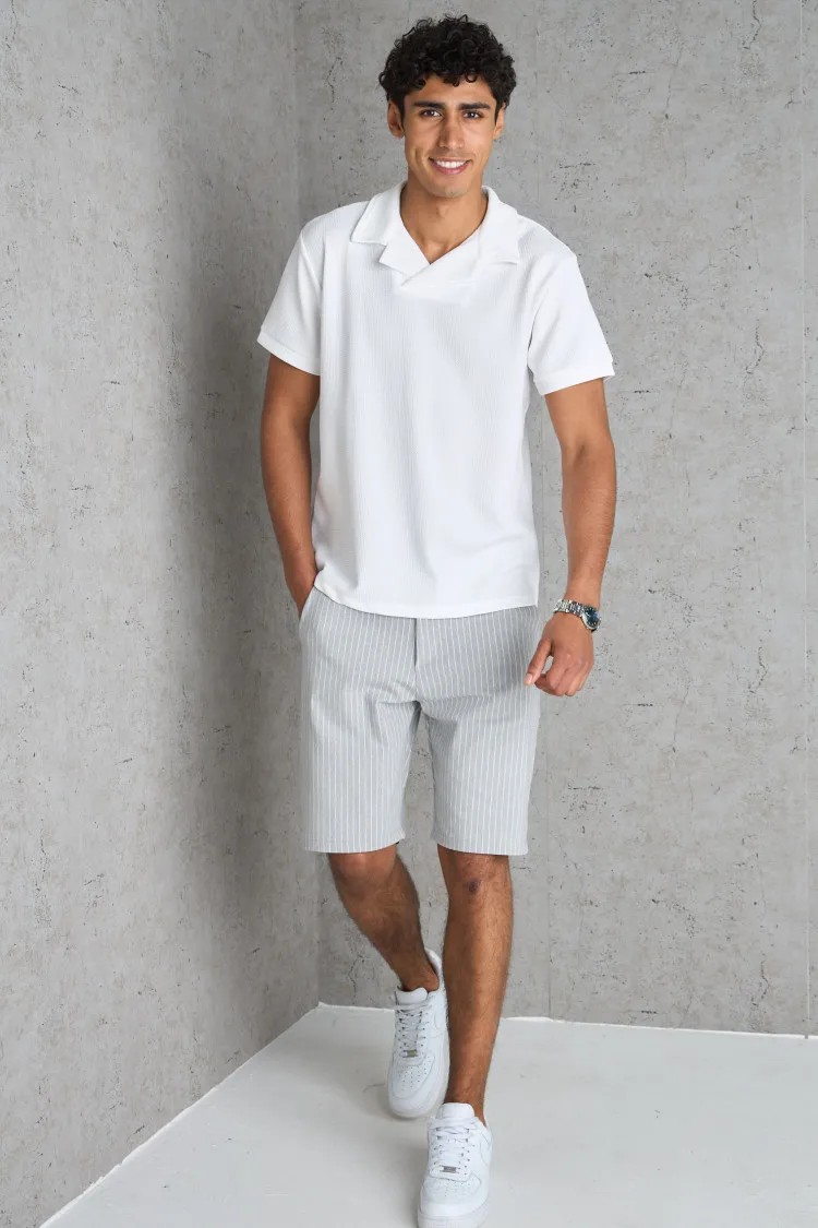 Polo basic blanc texturé