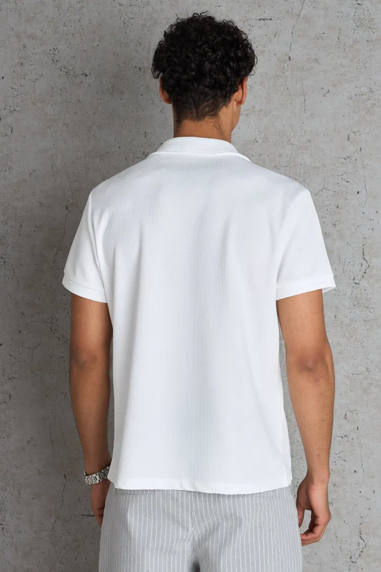 Polo basic blanc texturé